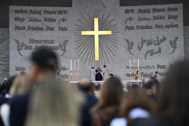 Pope Leo XIV delivers the homily during a mass at Beirut's waterfront on December 2, 2025. The pontiff arrived from Turkey on November 30, on his inaugural visit abroad as Pope and brought a message of hope, particularly to young people in Lebanon, whose faith in their beleaguered country has dwindled. (Photo by Jewel SAMAD / AFP)