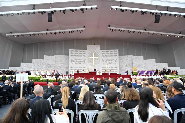 Pope Leo XIV leads a mass at Beirut's waterfront as part of his apostolic journey to Lebanon, in Beirut on December 2, 2025.  (Photo by Andreas SOLARO / AFP)