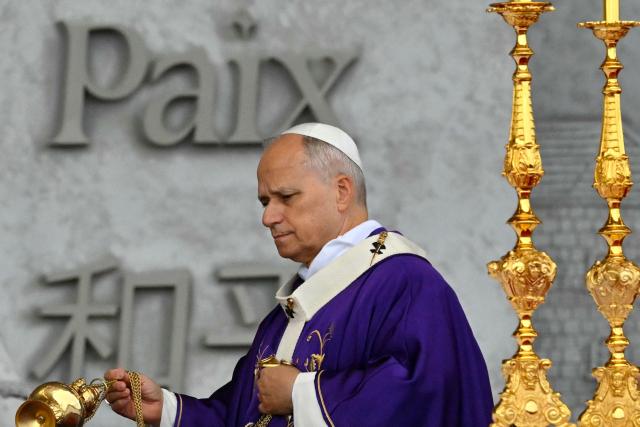 Pope Leo XIV leads a mass at Beirut's waterfront as part of his apostolic journey to Lebanon, in Beirut on December 2, 2025.  (Photo by Andreas SOLARO / AFP)