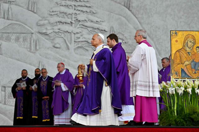 Pope Leo XIV leads a mass at Beirut's waterfront as part of his apostolic journey to Lebanon, in Beirut on December 2, 2025.  (Photo by Andreas SOLARO / AFP)