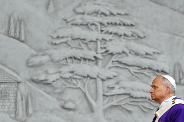 Pope Leo XIV leads a mass at Beirut's waterfront as part of his apostolic journey to Lebanon, in Beirut on December 2, 2025.  (Photo by Andreas SOLARO / AFP)