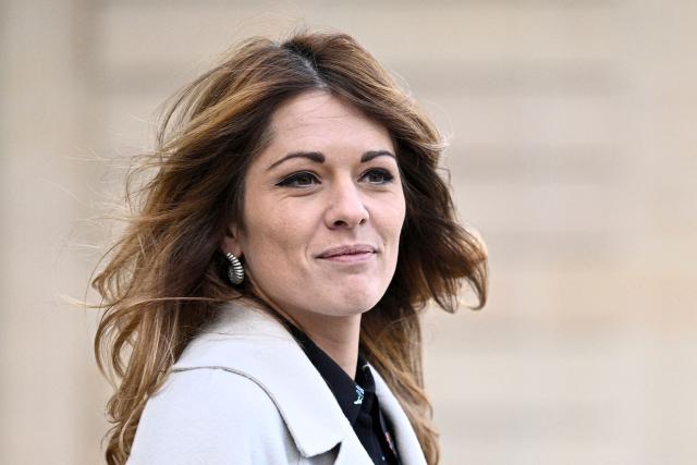 France's Government Spokesperson Maud Bregeon reacts as she leaves the Elysee Palace after the weekly cabinet meeting, in Paris on December 2, 2025. (Photo by JULIEN DE ROSA / AFP)