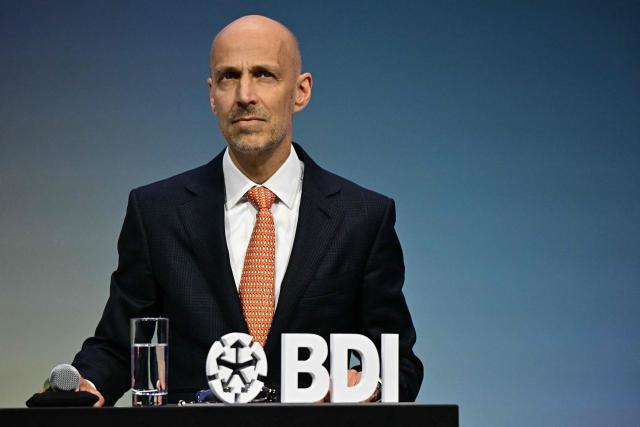 (FILES) Peter Leibinger, President of the Federation of German Industries (BDI), attends the "Day of German Industry" conference for economic policy in Berlin on June 23, 2025. Germany's economy is suffering its "deepest crisis" since World War II, an industry group warned on December 2, 2025, calling on Chancellor Friedrich Merz's government to take urgent action to spark a revival. Europe's biggest economy "is in free fall, but the federal government is not responding decisively enough," said Peter Leibinger, president of the Federation of German Industries (BDI). (Photo by Tobias SCHWARZ / AFP)