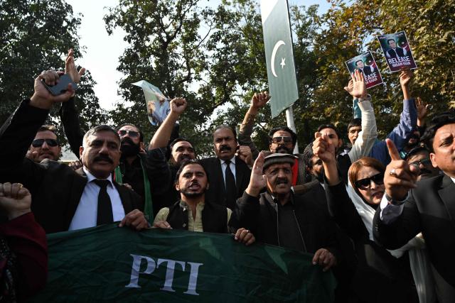 Pakistan Tehreek-e-Insaf (PTI) party supporters protest to demand release of their jailed leader and Pakistan's former Prime Minister Imran Khan, in Islamabad on December 2, 2025. (Photo by Aamir QURESHI / AFP)