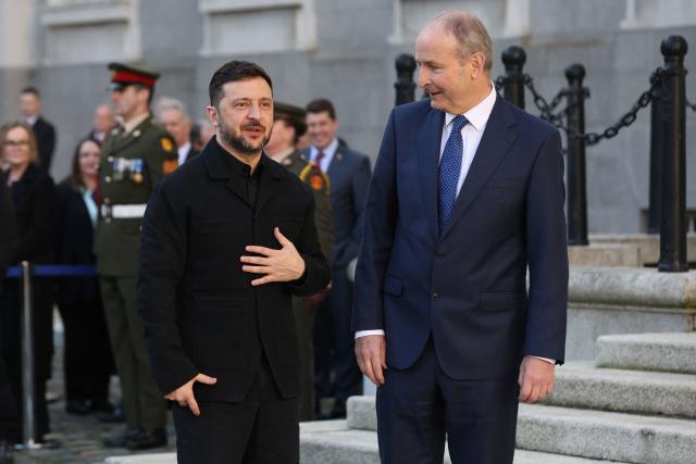 Ukraine's President Volodymyr Zelensky (L) meets with Ireland's Prime Minister Micheal Martin (R) during his visit to Dublin on December 2, 2025. (Photo by Paul Faith / AFP)