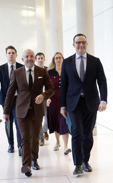 Jens Spahn (R), parliamentary group leader of the conservative Christian Democratic Union (CDU) party, and the CDU's sister party CSU's parliamentary group leader Alexander Hoffmann arrive to attend a parliamentary group meeting of the conservative party union on December 2, 2025 in Berlin, Germany. (Photo by Odd ANDERSEN / AFP)