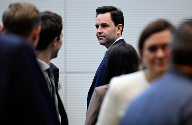 Johannes Winkel (C), leader of the youth organisation "Junge Union" (young union, JU) of Germany's Christian Democratic Union (CDU) party, arrives to attend a parliamentary group meeting of the conservative CDU/CSU party union on December 2, 2025 in Berlin, Germany. (Photo by John MACDOUGALL / AFP)