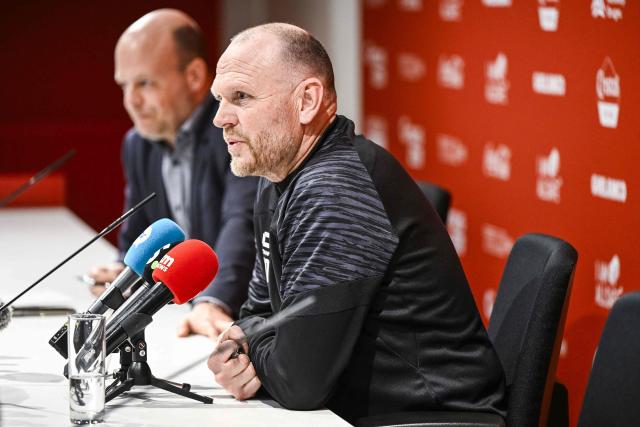 Antwerp's newly appointed Dutch head coach Joseph Oosting (R) gives his first press conference of the Belgian Pro League football team Royal Antwerp FC, in Antwerp on December 2, 2025. (Photo by Tom Goyvaerts / Belga / AFP) / Belgium OUT