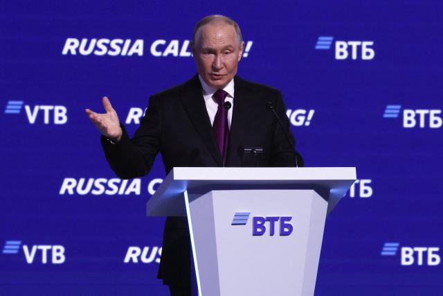 Russia's President Vladimir Putin gives a speech during a plenary session of the VTB Investment Forum "Russia Calling!" in Moscow on December 2, 2025. (Photo by SERGEI ILNITSKY / POOL / AFP)