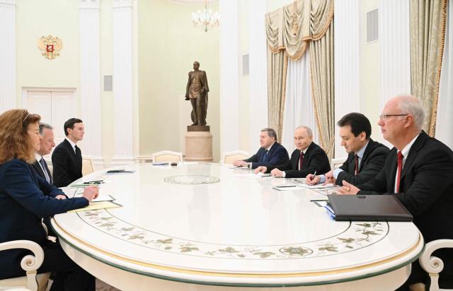 In this pool photograph distributed by the Russian state agency Sputnik, Russia's President Vladimir Putin, accompanied by Kremlin economic envoy Kirill Dmitriev and Kremlin aide Yuri Ushakov, meets with US special envoy Steve Witkoff and US President Donald Trump's son-in-law Jared Kushner at the Kremlin in Moscow on December 2, 2025. (Photo by Kristina Kormilitsyna / POOL / AFP)