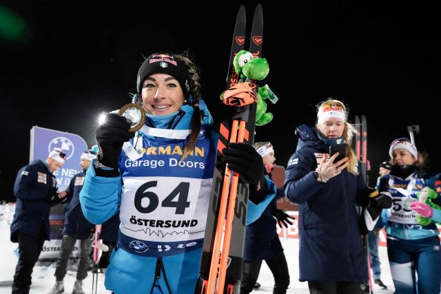 Italy's Dorothea Wierer celebrateswith her gold medal winning the women's 15km individual event of the IBU Biathlon World Cup in Oestersund, Sweden on December 2, 2025. (Photo by Bjorn LARSSON ROSVALL / TT NEWS AGENCY / AFP) / Sweden OUT