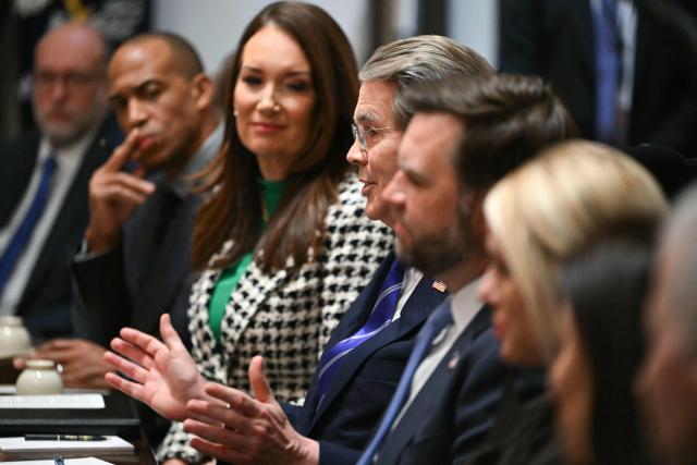 US Secretary of Treasury Scott Bessent (C) speaks during a Cabinet Meeting held by President Donald Trump in the Cabinet Room of the White House in Washington, DC on December 2, 2025. (Photo by ANDREW CABALLERO-REYNOLDS / AFP)