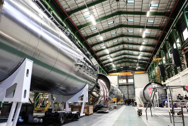 This photograph shows prototypes of a partially reusable light space launcher at the MaiaSpace aerospace company's facilities in Vernon, northwestern France on December 2, 2025. (Photo by Thibaud MORITZ / AFP)