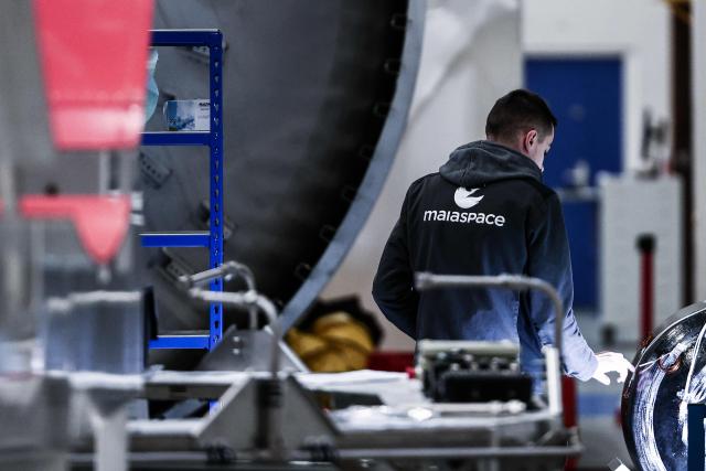 A MaiaSpace engineer works on the prototype of a partially reusable light space launcher 
at the MaiaSpace aerospace company's facilities in Vernon, northwestern France on December 2, 2025. (Photo by Thibaud MORITZ / AFP)