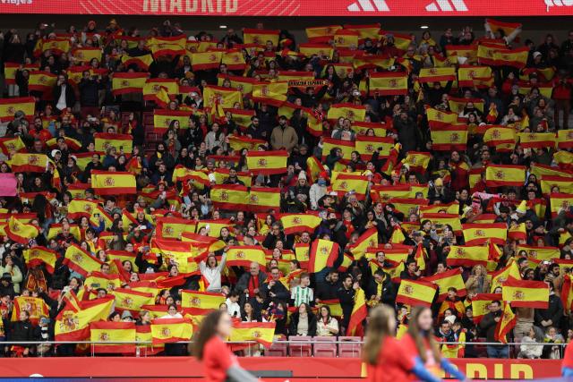Spain's fans cheer prior the UEFA Women's Nations League second leg final football match between Spain and Germany at the Metropolitano Stadium in Madrid on December 2, 2025. (Photo by Thomas COEX / AFP)
