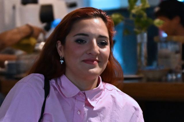 Jana Maradona, daughter of late Argentine football legend Diego Maradona, arrives at a preliminary trial hearing for his death in San Isidro, Buenos Aires province, on December 2, 2025. A court in Buenos Aires will decide on Tuesday, during a preliminary hearing how a new trial will be conducted for the death of Diego Maradona in 2020, following the annulment of the first trial. The scheduled start date has been set for March 17, 2026, although appeals by the defence teams of the seven accused health professionals still need to be addressed, which could delay the start. (Photo by Luis ROBAYO / AFP)