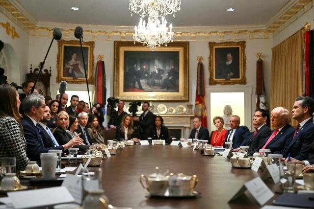 US Secretary of Treasury Scott Bessent (center L) speaks during a Cabinet Meeting hosted by US President Donald Trump (2R) in the Cabinet Room of the White House in Washington, DC on December 2, 2025. (Photo by ANDREW CABALLERO-REYNOLDS / AFP)
