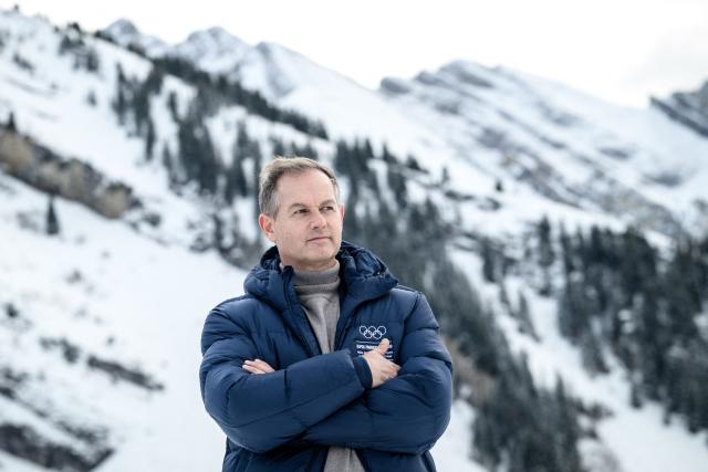 Edgar Gropiron, former Olympic skiing champion and President of the Coordination Committee for the 2030 Winter Olympics, looks on during a visit to Les Confins site in La Clusaz, central eastern France, on November 2, 2025, which is set to host the cross-country skiing competitions during the Winter Olympics in the French Alps in 2030. (Photo by ARNAUD FINISTRE / AFP)
