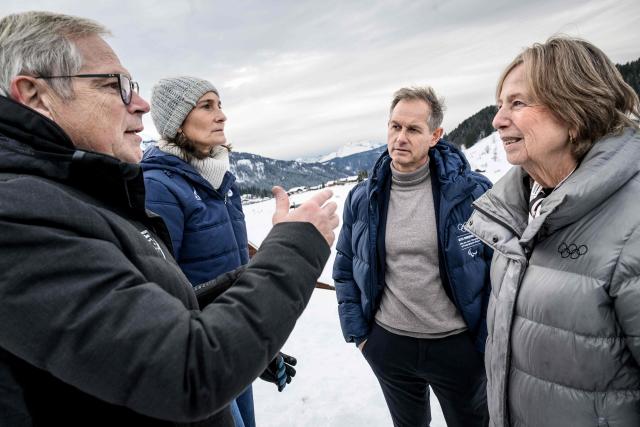 (From L) Mayor of La Clusaz Didier Thevenet (L), President of the French National Olympic and Sports Committee Amelie Oudea Castera (2L), former Olympic skiing champion and President of the Coordination Committee for the 2030 Winter Olympics in France Edgar Gropiron (2R) and Princess Nora of Liechtenstein (R) talk during a visit to Les Confins site in La Clusaz, central eastern France, on November 2, 2025, which is set to host the cross-country skiing competitions during the Winter Olympics in the French Alps in 2030. (Photo by ARNAUD FINISTRE / AFP)