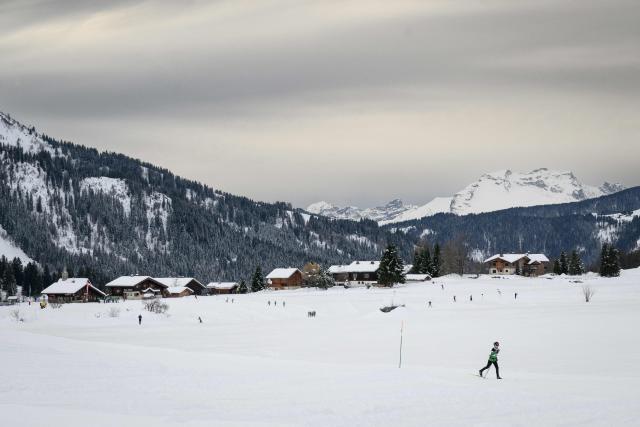 A schoolchild practices cross-country skiing on Les Confins site in La Clusaz, central eastern France, on November 2, 2025, which is set to host the cross-country skiing competitions during the Winter Olympics in the French Alps in 2030. (Photo by ARNAUD FINISTRE / AFP)
