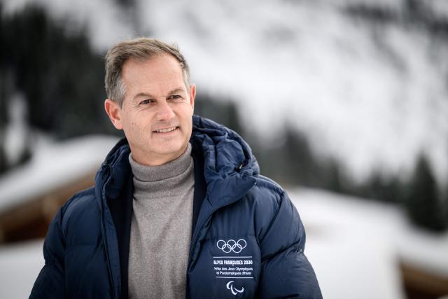Edgar Gropiron, former Olympic skiing champion and President of the Coordination Committee for the 2030 Winter Olympics, looks on during a visit to Les Confins site in La Clusaz, central eastern France, on November 2, 2025, which is set to host the cross-country skiing competitions during the Winter Olympics in the French Alps in 2030. (Photo by ARNAUD FINISTRE / AFP)