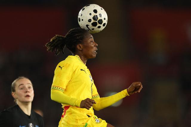 Ghana's midfielder #06 Jennifer Cudjoe heads the ball during the women's International football friendly match between England and Ghana at St Mary's Stadium in Southampton, southern England on December 2, 2025. (Photo by Adrian Dennis / AFP)