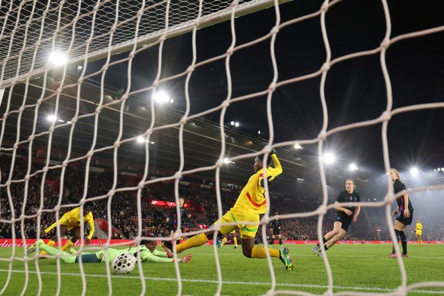 England's midfielder #08 Lucia Kendall (2R) scores the opening goal during the women's International football friendly match between England and Ghana at St Mary's Stadium in Southampton, southern England on December 2, 2025. (Photo by Adrian DENNIS / AFP)