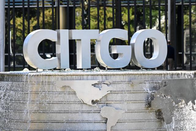 The logo of CITGO Petroleum Corporation is seen at the headquarter in Houston, Texas, on December 2, 2025. Venezuela on December 2, 2025 denounced what it called the "forced sale" of its most valuable overseas asset, oil company Citgo, after a US court authorized the transaction to pay off creditors. Citgo, a Houston-based subsidiary of Venezuela's PDVSA state oil company, is in the crosshairs of creditors seeking the settlement of debts in excess of $20 billion that cash-strapped Caracas has been unable or unwilling to pay. (Photo by RONALDO SCHEMIDT / AFP)