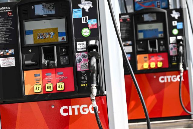 Gas pumps are seen at a CITGO gas station in Houston, Texas, on December 2, 2025. Venezuela on December 2, 2025 denounced what it called the "forced sale" of its most valuable overseas asset, oil company Citgo, after a US court authorized the transaction to pay off creditors. Citgo, a Houston-based subsidiary of Venezuela's PDVSA state oil company, is in the crosshairs of creditors seeking the settlement of debts in excess of $20 billion that cash-strapped Caracas has been unable or unwilling to pay. (Photo by RONALDO SCHEMIDT / AFP)