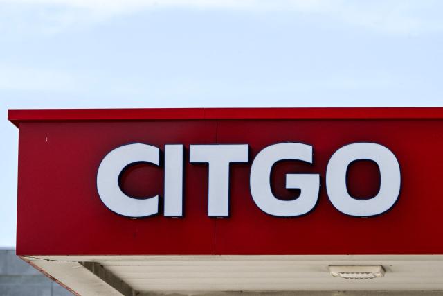 The logo of CITGO is seen at a gas station in Houston, Texas, on December 2, 2025. Venezuela on December 2, 2025 denounced what it called the "forced sale" of its most valuable overseas asset, oil company Citgo, after a US court authorized the transaction to pay off creditors. Citgo, a Houston-based subsidiary of Venezuela's PDVSA state oil company, is in the crosshairs of creditors seeking the settlement of debts in excess of $20 billion that cash-strapped Caracas has been unable or unwilling to pay. (Photo by RONALDO SCHEMIDT / AFP)