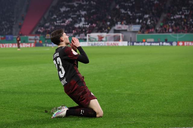 Leipzig's Serbian midfielder #33 Andrija Maksimovic celebrates scoring a non-validated goal because of offside during the German Cup (DFB-Pokal) round of 16 football match between RB Leipzig and 1 FC Magdeburg in Leipzig, eastern Germany on December 2, 2025. (Photo by Ronny HARTMANN / AFP) / DFB REGULATIONS PROHIBIT ANY USE OF PHOTOGRAPHS AS IMAGE SEQUENCES AND QUASI-VIDEO.