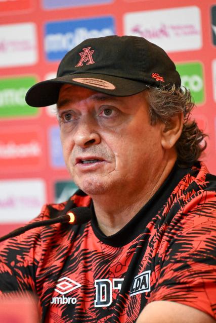 Alajuelense's coach Oscar Ramirez speaks during a press conference at Cementos Progreso Stadium in Guatemala City on December 2, 2025. (Photo by JOHAN ORDONEZ / AFP)
