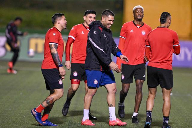 Xelaju's Uruguayan goalkeeper Ruben Dario Silva (C) smiles during a training session at Cementos Progreso Stadium in Guatemala City on December 2, 2025. (Photo by JOHAN ORDONEZ / AFP)