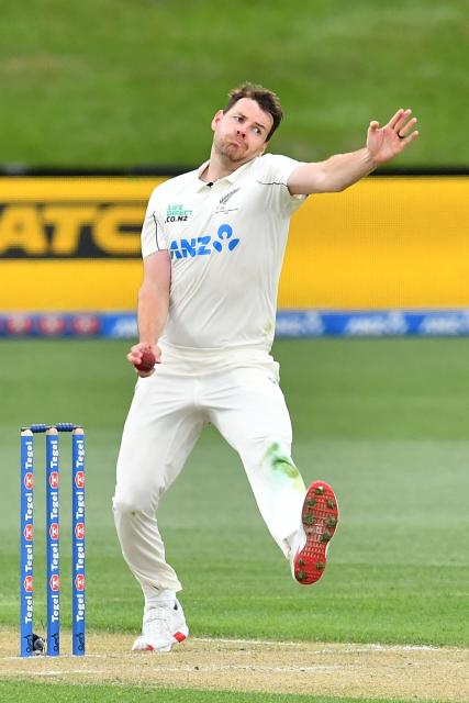 New Zealand's Jacob Duffy bowls during day two of the first Test cricket match between New Zealand and West Indies at Hagley Oval in Christchurch on December 3, 2025. (Photo by Sanka Vidanagama / AFP)
