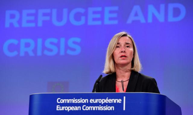(FILES) High Representative/Vice-President Federica Mogherini gives a joint press conference with International Organisation for Migration's Director-General Antonio Vitorino and United Nations High Commissioner for Refugees Filippo Grandi (unseen) during the International Solidarity Conference on the Venezuelan refugee and migrant crisis at the EU Headquarters in Brussels on October 29, 2019. The EU's former foreign policy chief Federica Mogherini has been charged along with two others in a probe into "fraud and corruption" over contracts to train future European diplomats, the European Public Prosecutor's Office said on December 3, 2025. (Photo by JOHN THYS / AFP)