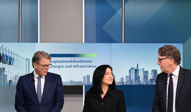 (L-R) Deutsche Bank CEO Christian Sewing, German Economy and Energy Minister Katherina Reiche and KfW CEO Stefan Wintels attend the "Capital Markets Conference on Energy Transition and Infrastructure for Germany" on December 3, 2025 in Frankfurt am Main, western Germany. (Photo by Kirill KUDRYAVTSEV / AFP)
