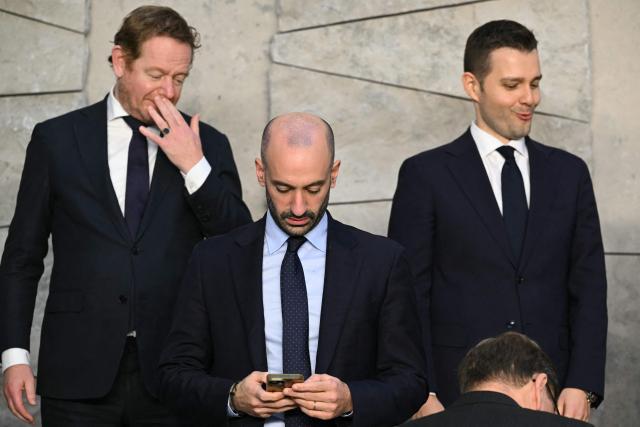 (From L) Netherlands' outgoing Foreign Minister David van Weel, France's junior Minister in charge of Europe Benjamin Haddad and North Macedonia's Foreign Minister Timco Mucunski pose during a group photo following a meeting of NATO Ministers of Foreign Affairs at NATO headquarters in Brussels on December 3, 2025. (Photo by NICOLAS TUCAT / AFP)