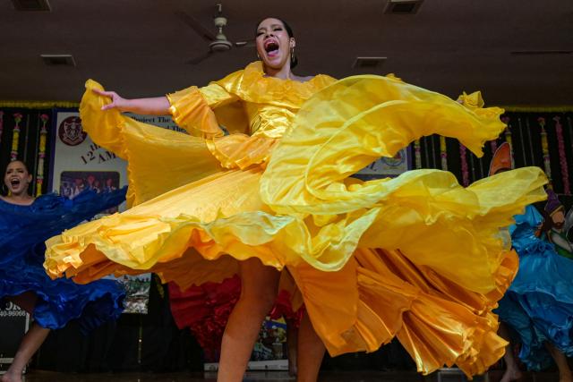 Colombian artists perform a dance during the International Cultural Folk Festival in Amritsar on December 3, 2025. (Photo by Narinder NANU / AFP)