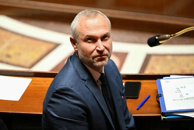 France's junior Minister in charge of parliament relations Laurent Panifous looks on during a session of questions to the government at the National Assembly, the French Parliament lower house, in Paris on December 3, 2025. (Photo by Bertrand GUAY / AFP)