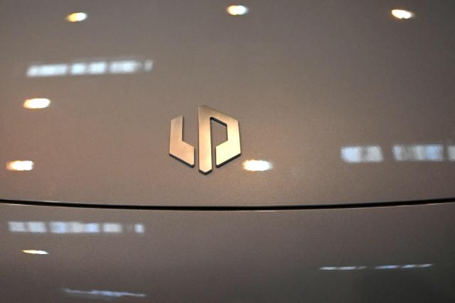 A Leapmotor car is on display at the Essen Motor Show in Essen, western Germany on December 3, 2025. The Essen Motor Show, featuring the areas of performanc,e & racing, tuning & lifestyle, motorsport and classic cars, takes place from November 29 to December 7, 2025. (Photo by Ina FASSBENDER / AFP)