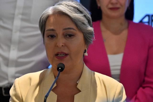 Chile's presidential candidate Jeannette Jara of the Unidad por Chile coalition, speaks after a debate organised by the Chilean Radio Association (Archi) in Santiago, on December 3, 2025. The clock is ticking down to a presidential run-off election on December 14, with far-right candidate Jose Antonio Kast the frontrunner to win the second round of voting against leftist Jeannette Jara. (Photo by RODRIGO ARANGUA / AFP)