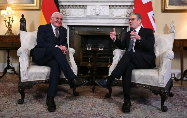 Britain's Prime Minister Keir Starmer talks with Germany's President Frank-Walter Steinmeier during a meeting inside 10 Downing Street in central London on December 3, 2025, the first day of a three-day state visit by the German president. (Photo by JUSTIN TALLIS / POOL / AFP)