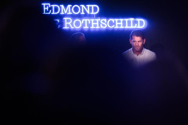 French skipper Charles Caudrelier looks on as he takes part in a press conference prior to the unveiling of the Ultim multihull Gitana 18 Maxi Edmond de Rothschild in Lorient, north-western France on December 3, 2025. (Photo by Loic VENANCE / AFP)