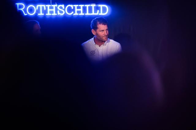 French skipper Charles Caudrelier looks on as he takes part in a press conference prior to the unveiling of the Ultim multihull Gitana 18 Maxi Edmond de Rothschild in Lorient, north-western France on December 3, 2025. (Photo by Loic VENANCE / AFP)