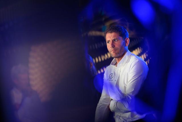 French skipper Charles Caudrelier looks on as he takes part in a press conference prior to the unveiling of the Ultim multihull Gitana 18 Maxi Edmond de Rothschild in Lorient, north-western France on December 3, 2025. (Photo by Loic VENANCE / AFP)