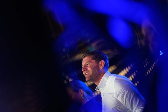 French skipper Charles Caudrelier reacts as he takes part in a press conference prior to the unveiling of the Ultim multihull Gitana 18 Maxi Edmond de Rothschild in Lorient, north-western France on December 3, 2025. (Photo by Loic VENANCE / AFP)
