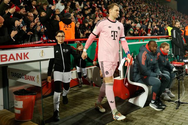 Bayern Munich's German goalkeeper #01 Manuel Neuer arrives prior to the German Cup (DFB-Pokal) round of 16 football match between 1 FC Union Berlin and FC Bayern Munich in Berlin on December 3, 2025. (Photo by Odd ANDERSEN / AFP) / DFB REGULATIONS PROHIBIT ANY USE OF PHOTOGRAPHS AS IMAGE SEQUENCES AND QUASI-VIDEO.
