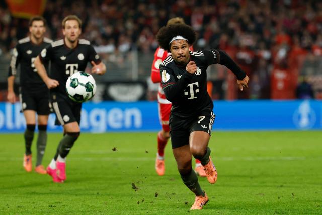Bayern Munich's German forward #07 Serge Gnabry runs for the ball during the German Cup (DFB-Pokal) round of 16 football match between 1 FC Union Berlin and FC Bayern Munich in Berlin on December 3, 2025. (Photo by Odd ANDERSEN / AFP) / DFB REGULATIONS PROHIBIT ANY USE OF PHOTOGRAPHS AS IMAGE SEQUENCES AND QUASI-VIDEO.