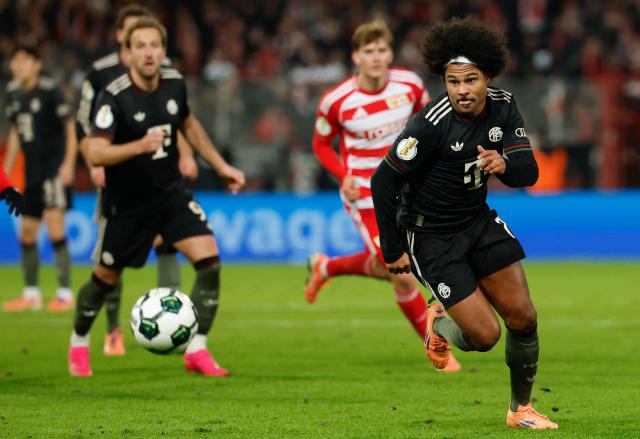 Bayern Munich's German forward #07 Serge Gnabry runs for the ball during the German Cup (DFB-Pokal) round of 16 football match between 1 FC Union Berlin and FC Bayern Munich in Berlin on December 3, 2025. (Photo by Odd ANDERSEN / AFP) / DFB REGULATIONS PROHIBIT ANY USE OF PHOTOGRAPHS AS IMAGE SEQUENCES AND QUASI-VIDEO.