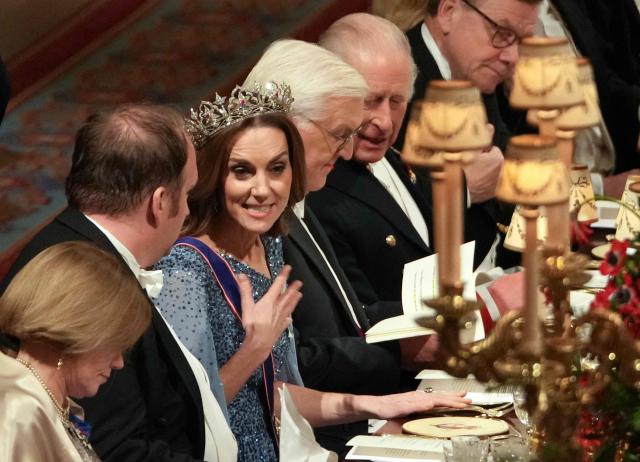 Britain's Catherine, Princess of Wales, Germany's President Frank-Walter Steinmeier, Britain's King Charles III  attends a State Banquet at Windsor Castle in Windsor, on December 3, 2025, the first day of a three day state visit by the German President. President Frank-Walter Steinmeier received a ceremonial welcome to Britain Wednesday as his state visit got into full swing -- the first by Germany's official head of state in 27 years. (Photo by CARLOS JASSO / POOL / AFP)